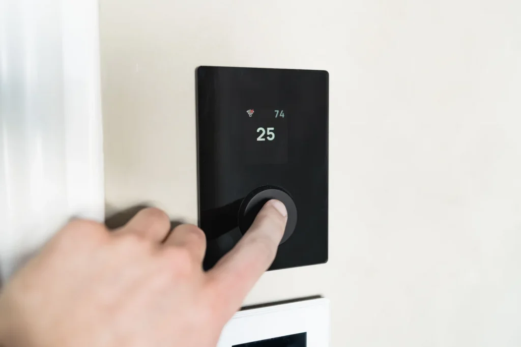 Smart thermostat on interior wall of Surprise home